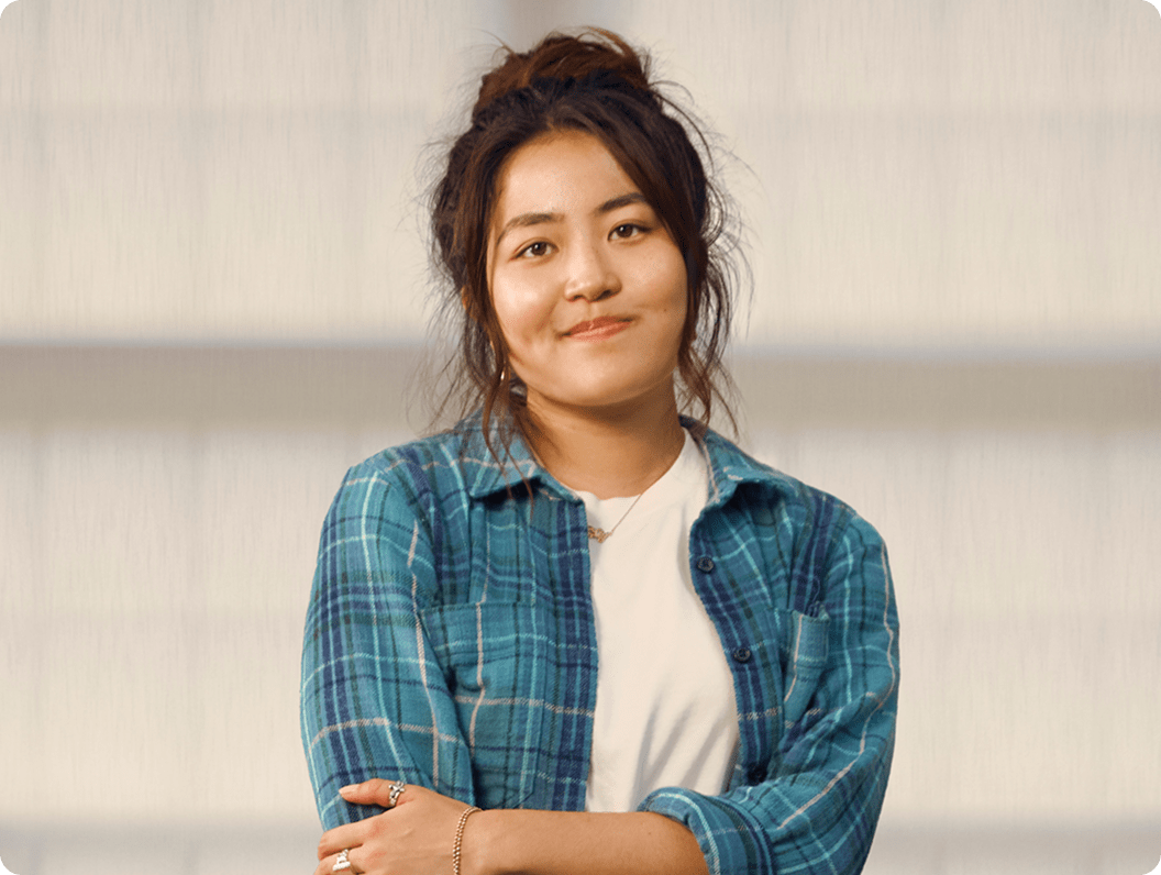 Emily, a 23-year-old woman with ADHD, in her apartment.