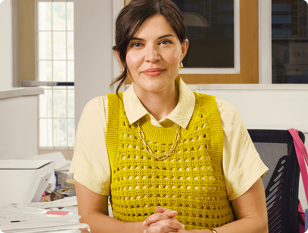 Kate, a 38-year-old woman with ADHD, at her desk.